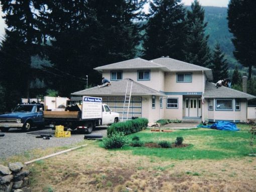 All Purpose Roofiing Residential grey roof with truck